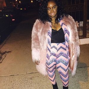 Pink knit pant suit.